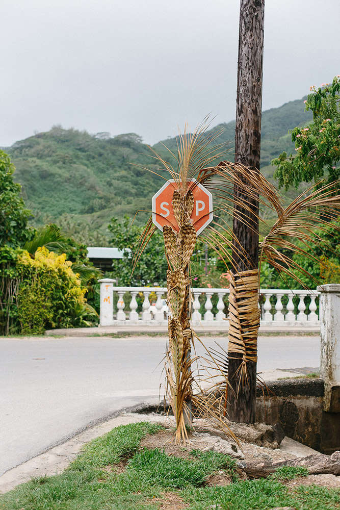 Stop sign decorated with weaving