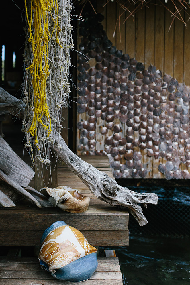 Pearl farm details with ceramics and shells