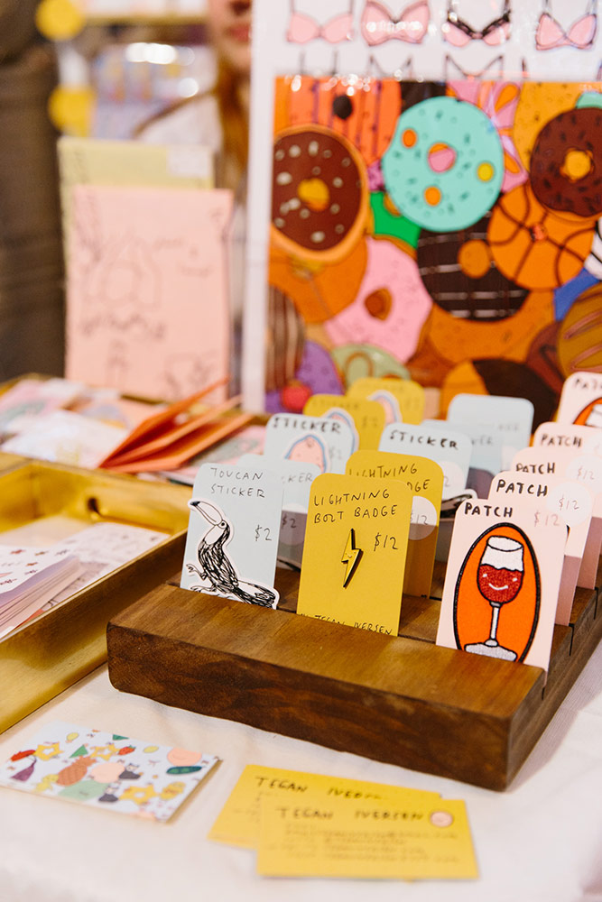 Quirky illustrated badges, posters and cards from local artists