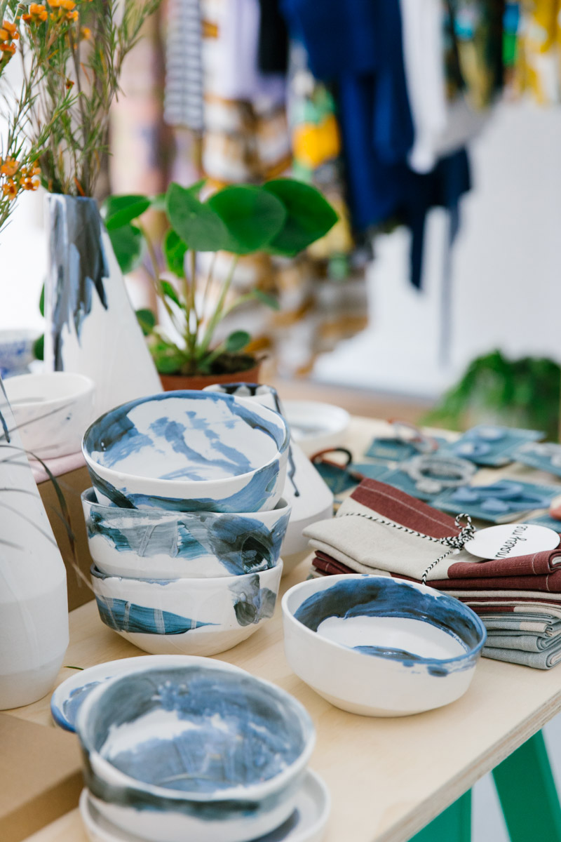 Handmade and hand painted porcelain bowls with blue swishes of paint