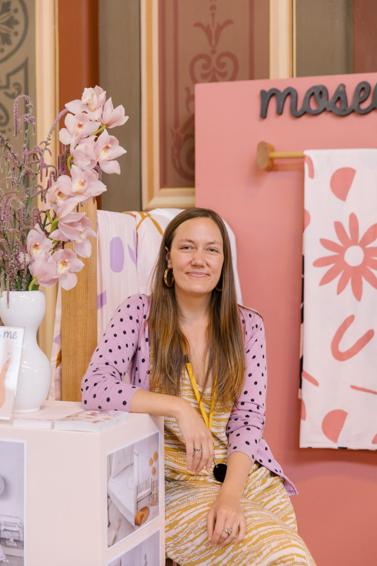 Mosey Me founder smiles for a portrait, Melbourne made bedding