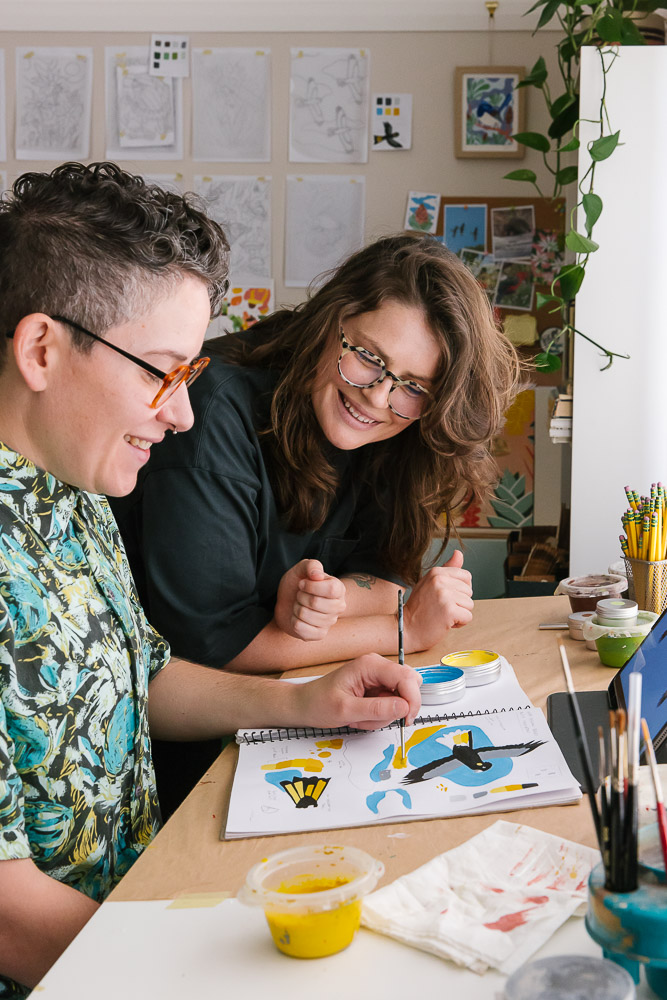 Outer Island founders, creatives and life partners Stephanie and Amy work on their newest Bushwalking Collection of handpainted prints and teatowel designs
