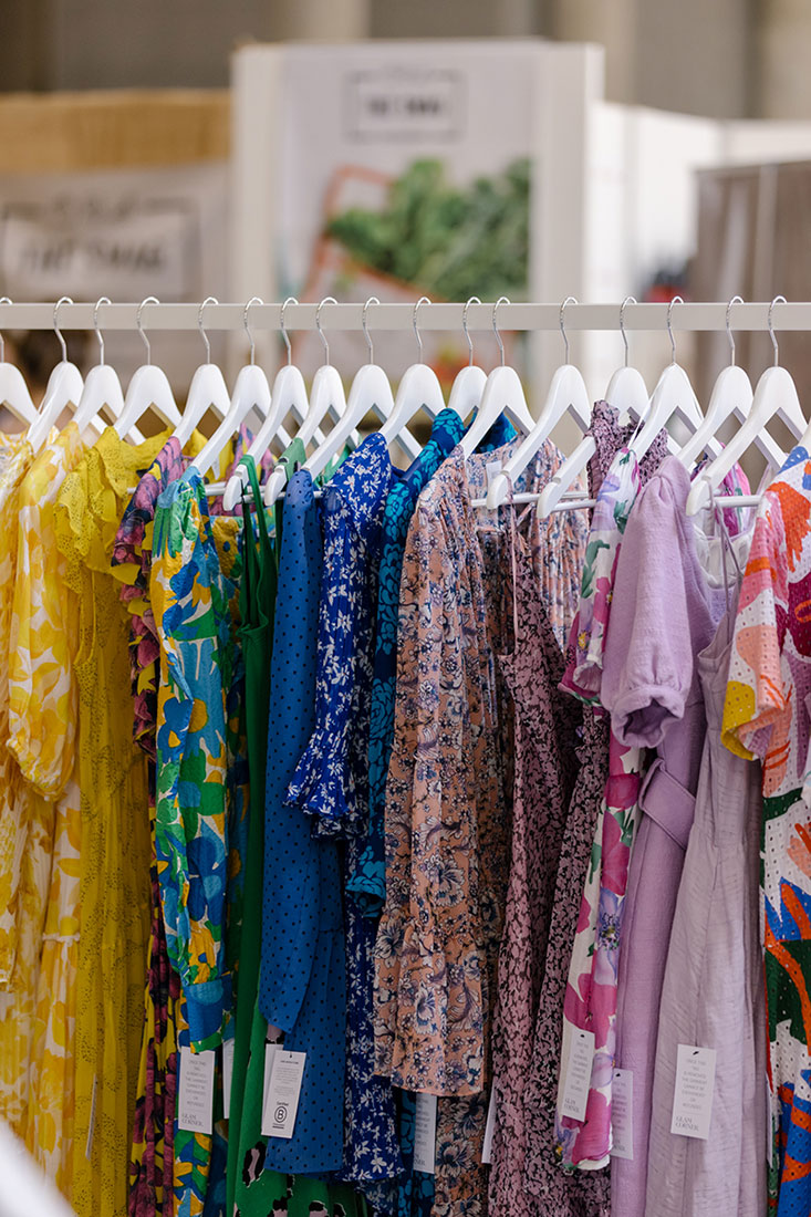 The Glam Corner rack of colourful dresses ready to rent for any occasion