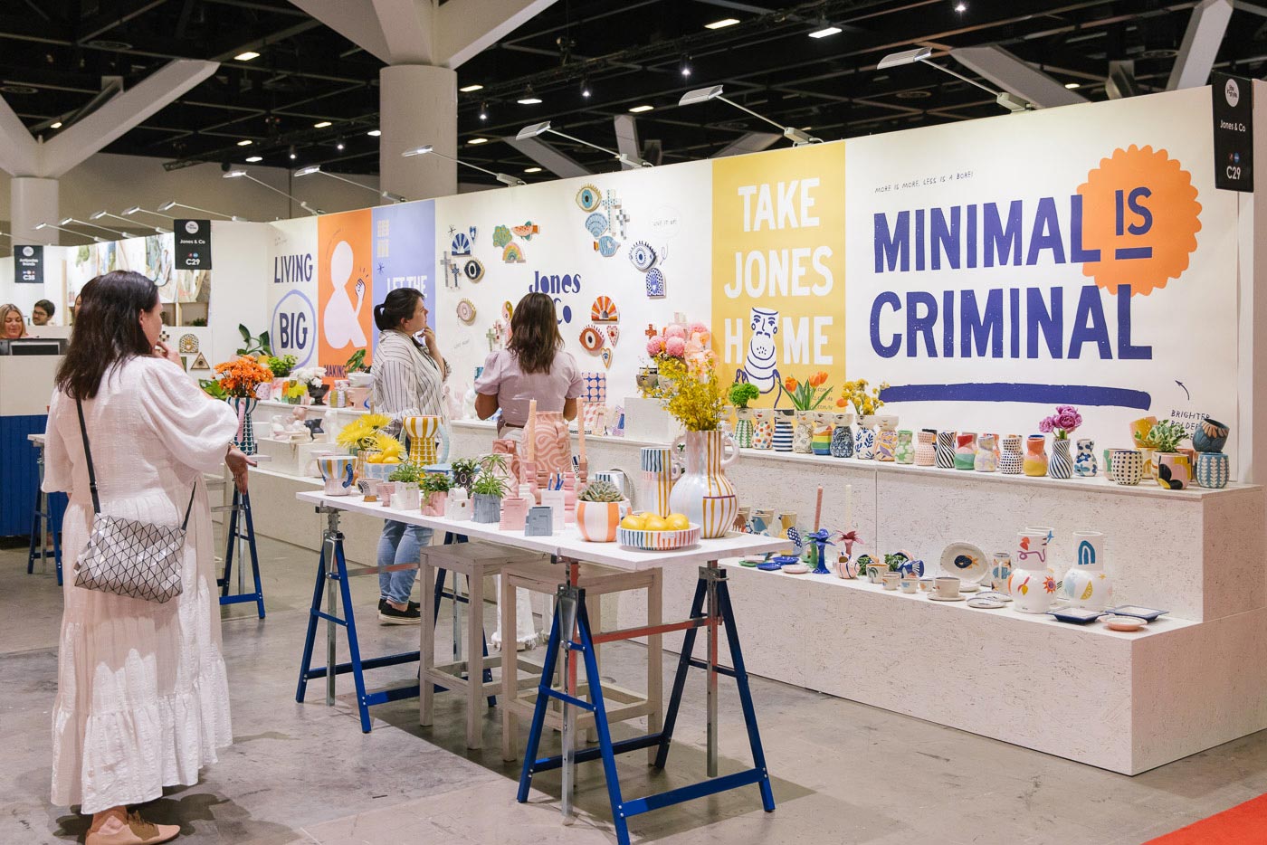 Wide angle of Jones and Co exhibitor stand featuring vibrant and colourful ceramic homewares