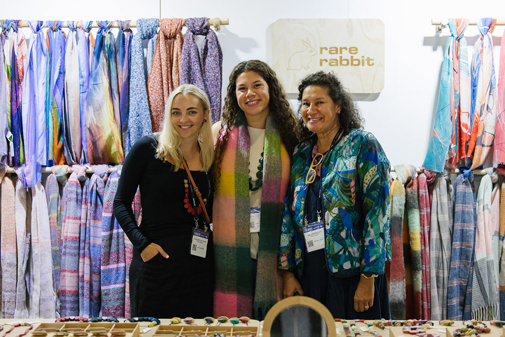 Rare Rabbit Exhibitors at Life Instyle Sydney pose for a photo together in front of their stand