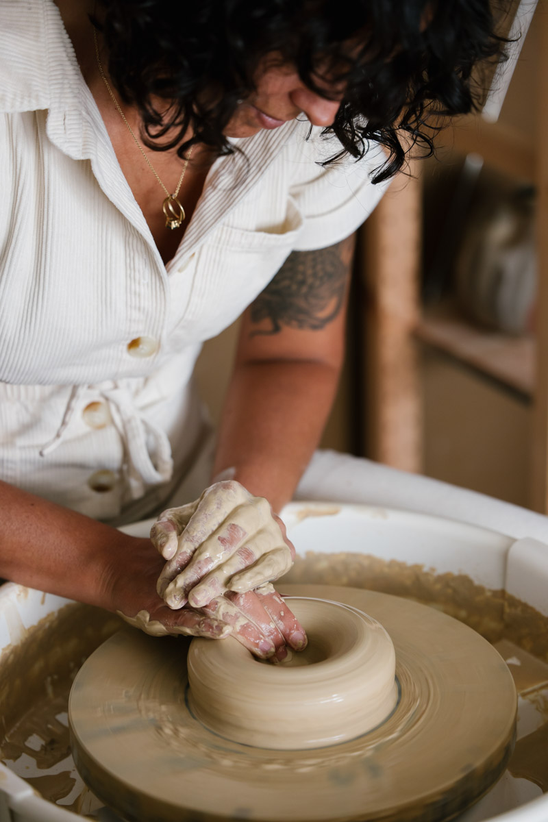 Centering and opening clay on the pottery wheel