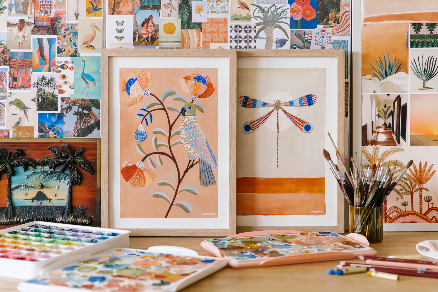 On the desk of artist Karina Jambrak featuring two of her framed prints, photo by Samee Lapham